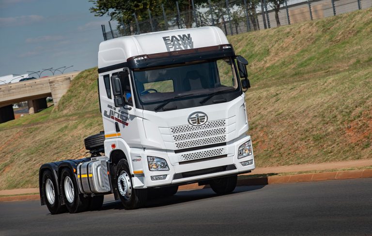 FAW JH6 33.420FT truck tractor with 420HP marked on the cab, the 420 in the model designation