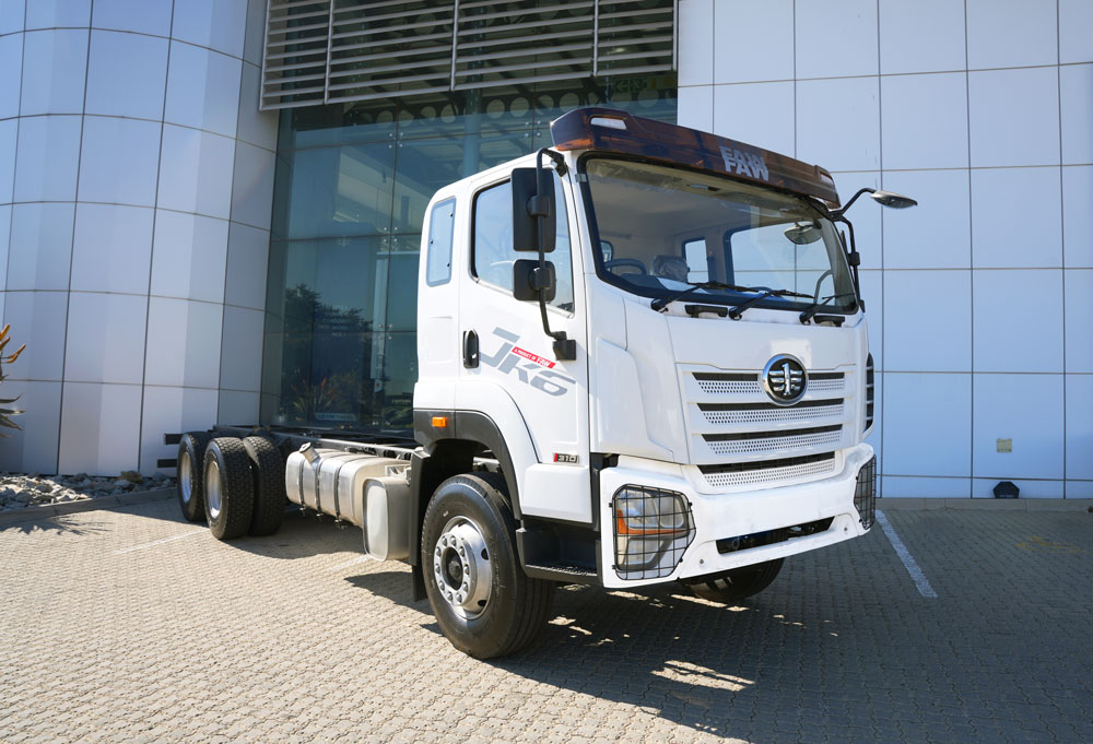 FAW JK6 28.310 FL rigid chassis-cab with no body fitted, showing the bare chassis rails behind the cab